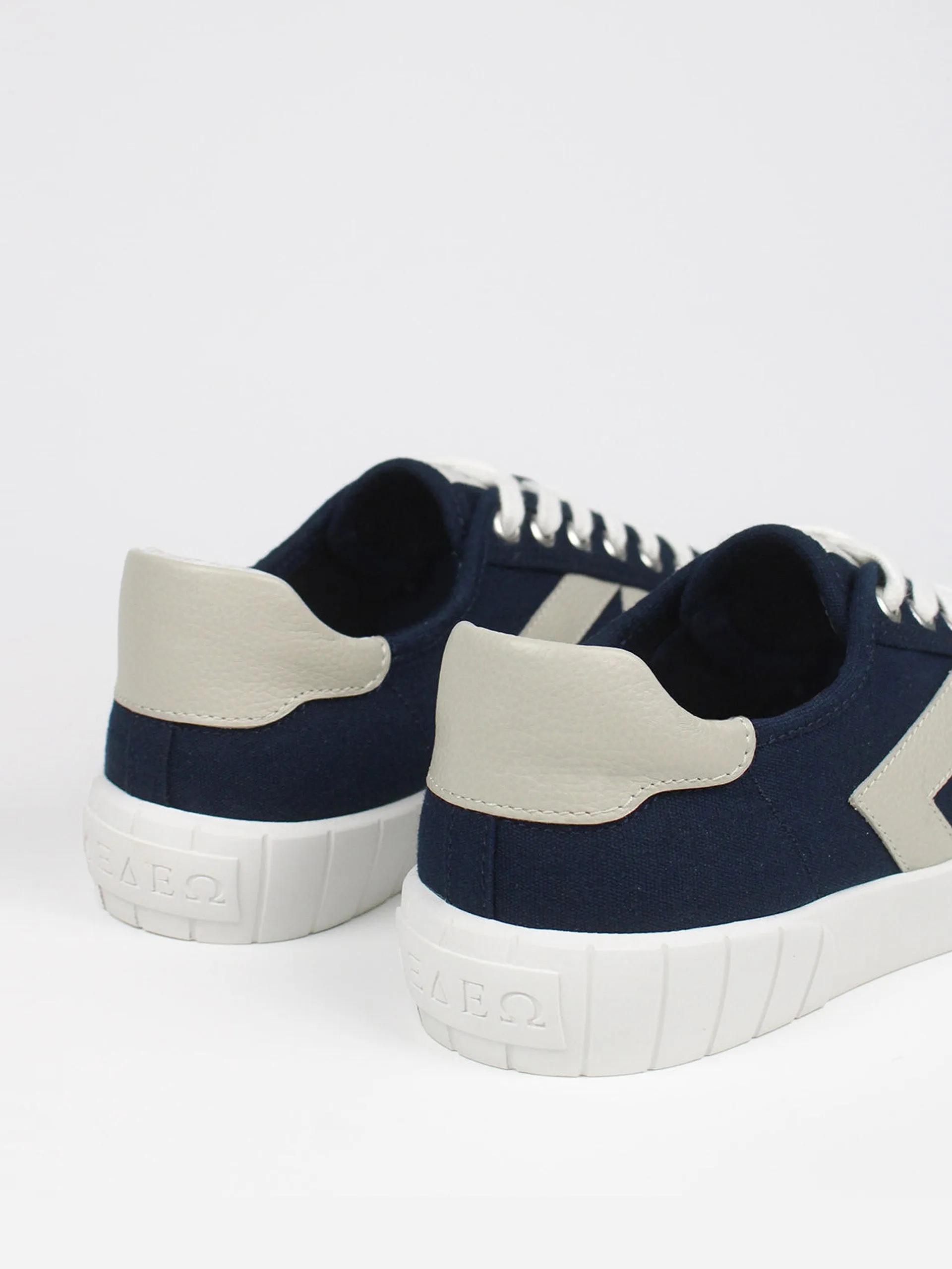 The Helios navy and beige trainers